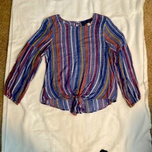 Denim striped long sleeve shirt. Tues in front. Tapers down in back. Size XS